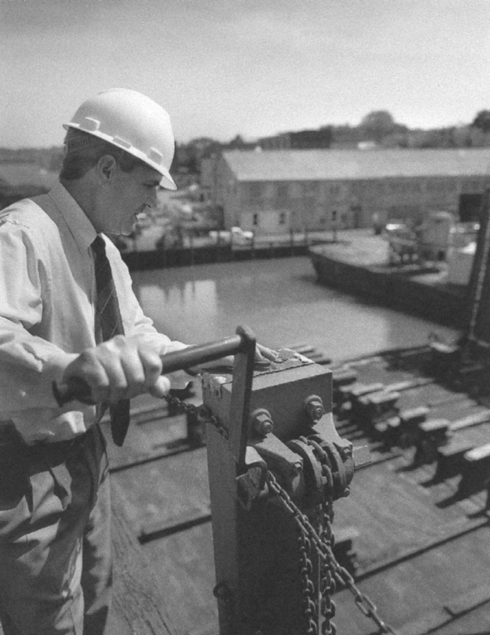 Steve Kalil, President of Caddell Dry Dock &amp; Repair Co., on wing wall of a dry dock