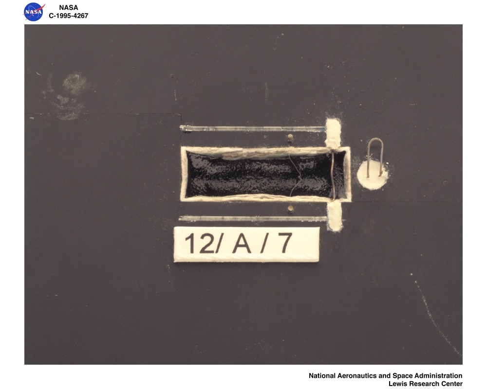 DIFFUSIVE AND RADIATIVE TRANSPORT IN FIRES EXPERIMENT DARTFIRE SAMPLE HOLDERS