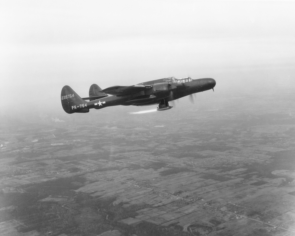 P-61 AIRPLANE IN FLIGHT TEST WITH RAM JET BURNING