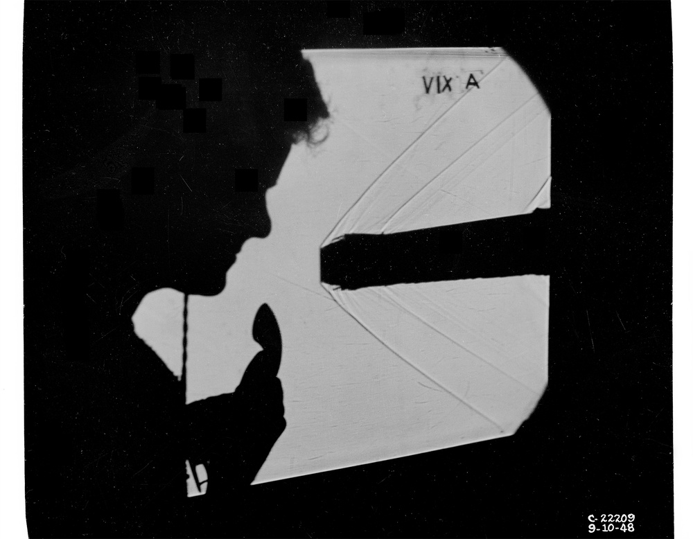 HIGH SPEED MOVIES THROUGH SCHLIEREN EQUIPMENT 18X18 INCH SUPERSONIC WIND TUNNEL SHADOWGRAPH OF 18X18 INCH SUPERSONIC WIND TUNNEL WITH JIM CONNORS