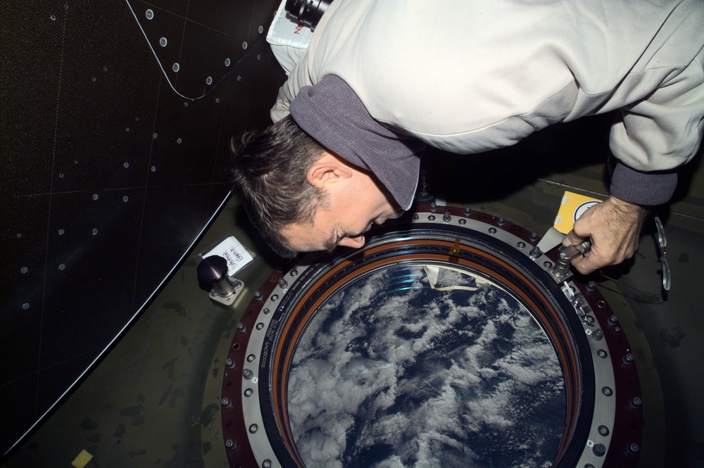 View of Voss at photo quality window in Destiny Laboratory module