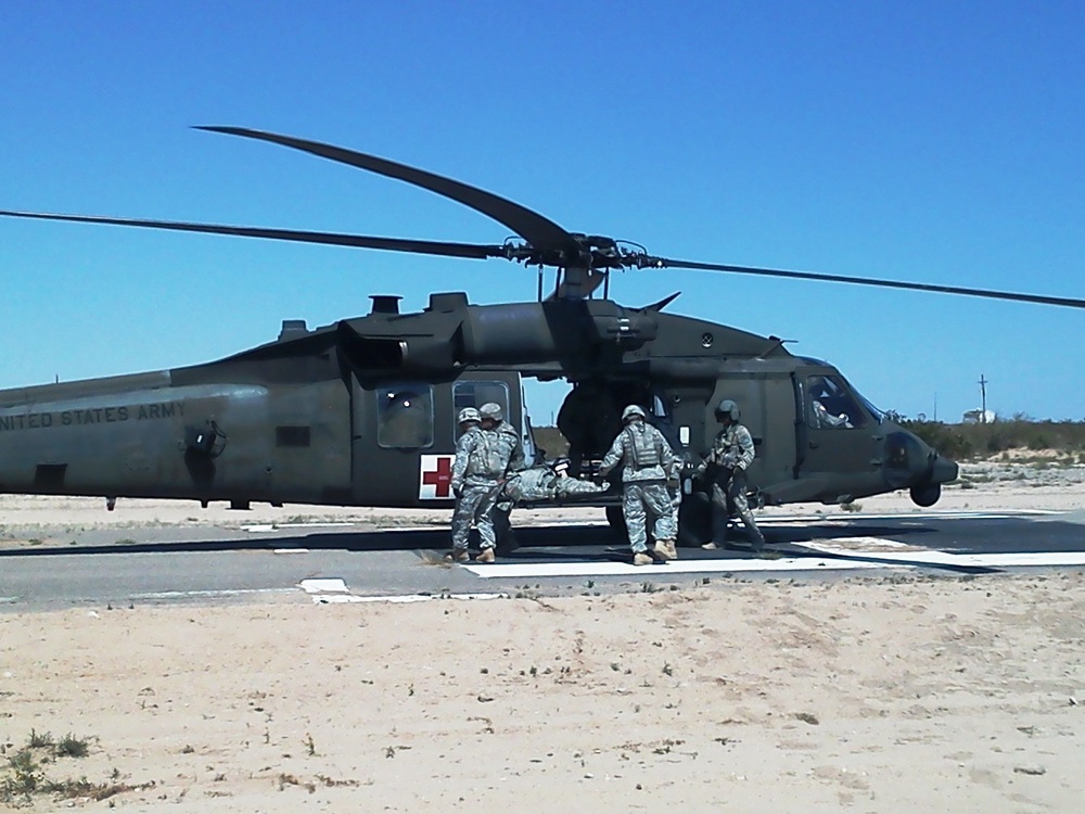 'Redhawk' trainers, 1st Armored soldiers work together to hone MEDEVAC skills