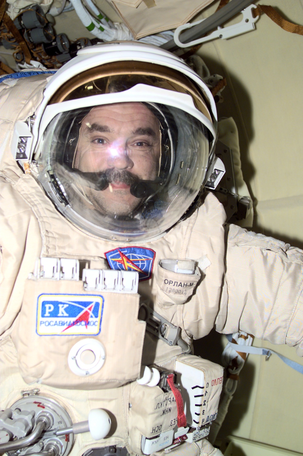 Tyurin tests his Orlan suit in Pirs during Expedition Three