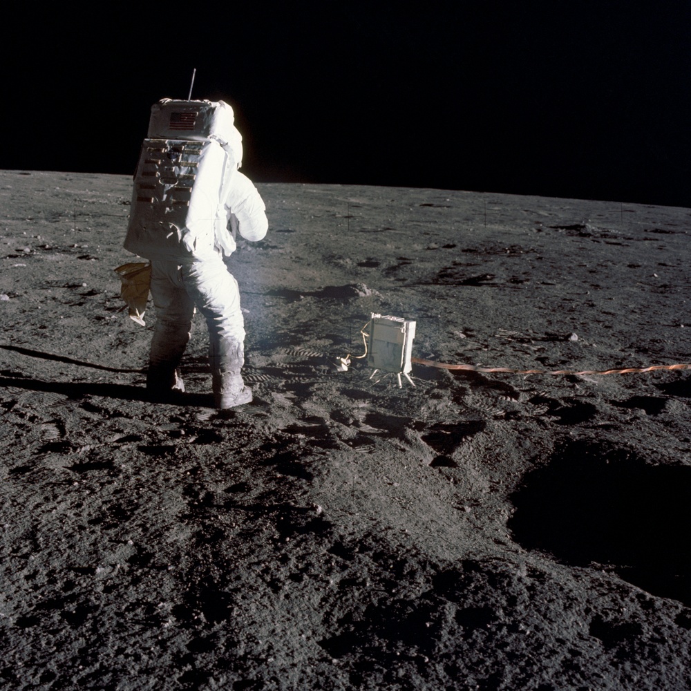 Apollo 12 Mission image  - Astronaut Bean deploys ion detector experiment