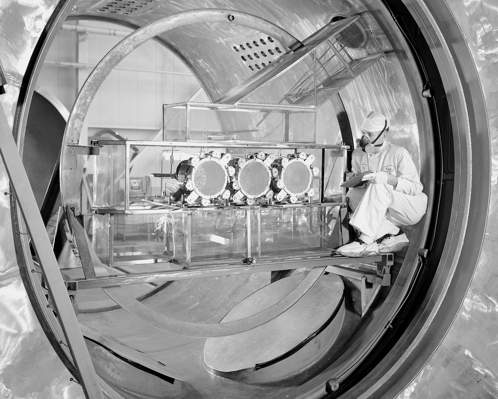 CLUSTER OF 3 ELECTRON BOMBARDMENT ION THRUSTERS LOCATED IN LARGE VACUUM CHAMBER AT THE ELECTRIC PROPULSION LABORATORY EPL