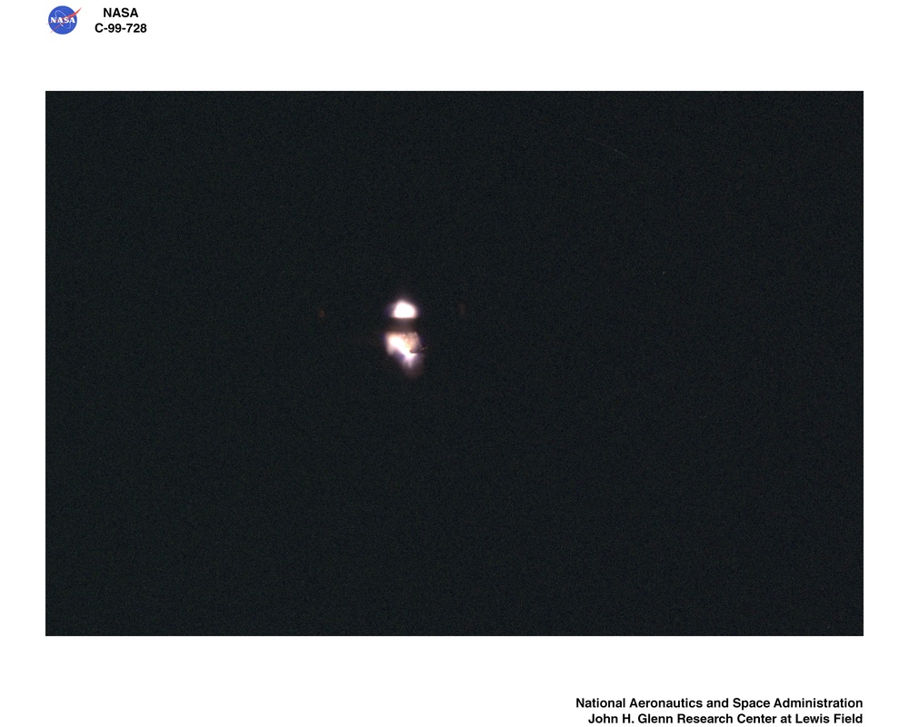 TRANSITION FROM IGNITION TO FLAME GROWTH UNDER EXTERNAL RADIATION IN THREE DIMENSIONS TIGER-3D TEST RESULTS FROM THE JAPAN MICROGRAVITY CENTER JAMIC