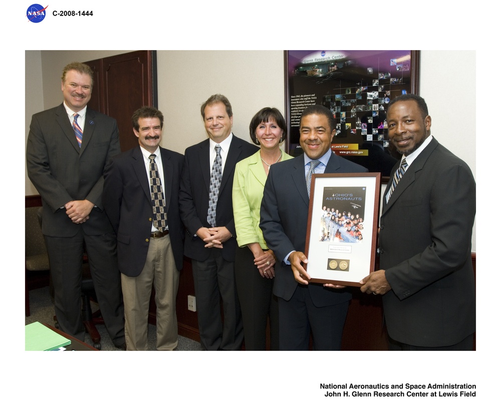 Presentation by the Center Director, of an Ohio Astronaut plaque to management representatives of Zin Technologies, Inc.