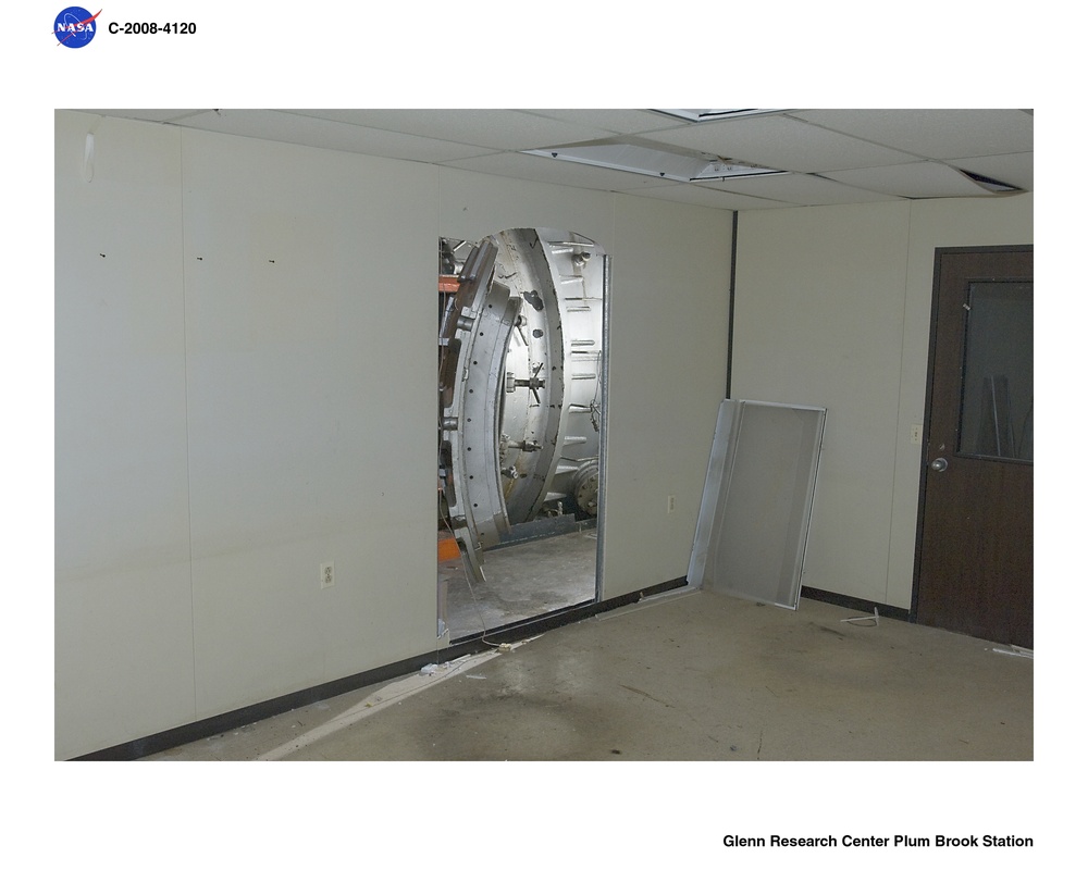 Propulsion Systems Lab 1-2 Survey:  Hole cut in Office Wall Revealing Chamber No. 2