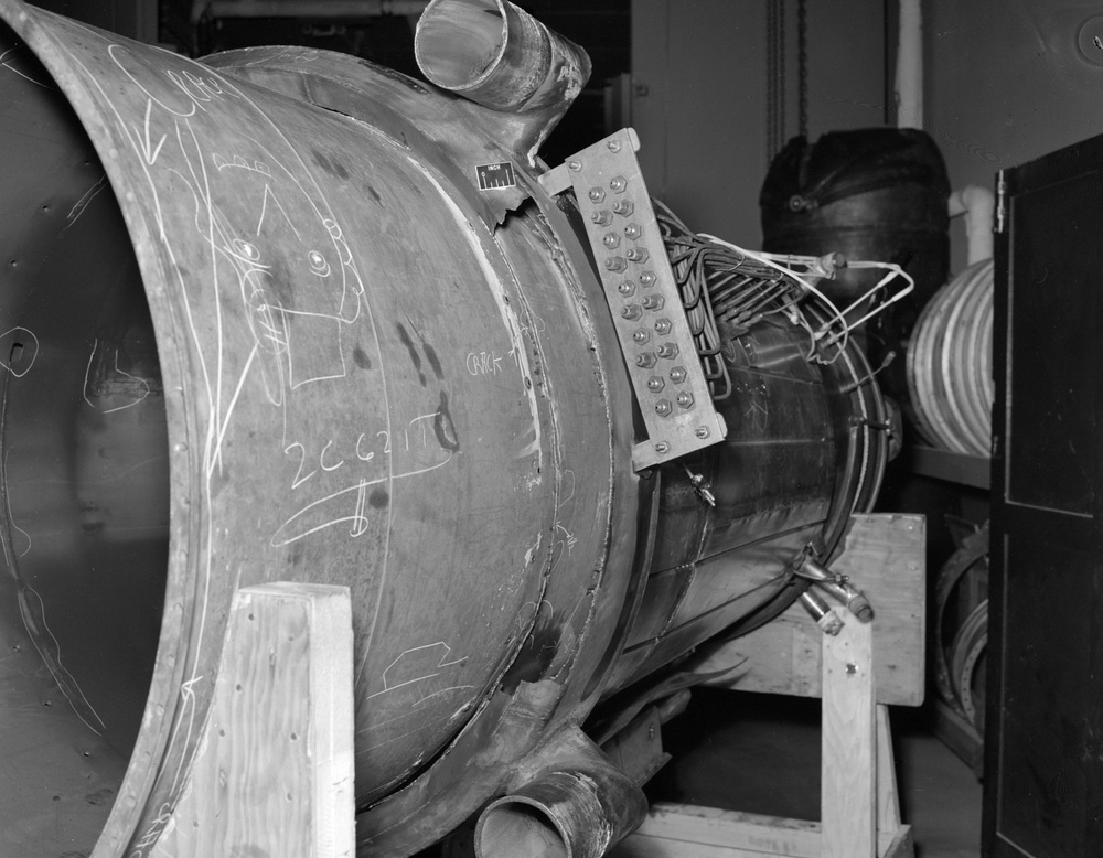 WRECKED AFTERBURNER IN CELL 2 OF EPRB ENGINE PROPULSION RESEARCH BUILDING - AFTERBURNER IS MODIFIED J-47-GE-17 - SPECIAL NACA FLAMEHOLDERS FOR J-47-GE-17 ENGINE