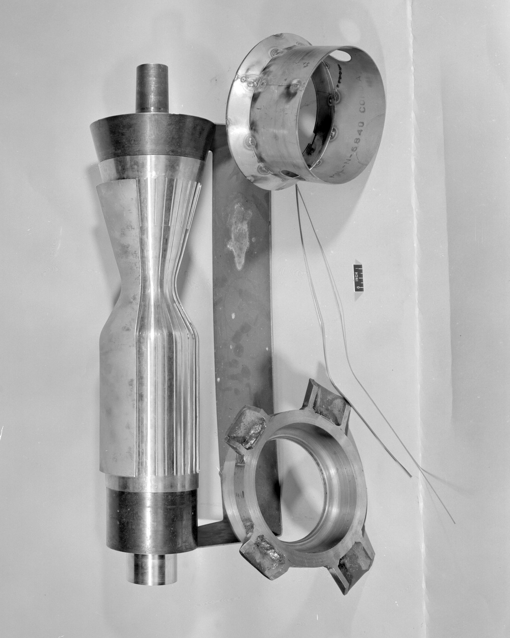 FABRICATION TECHNIQUES USED IN 5000 POUND THRUST ROCKET CHAMBER WITH LONGITUDINAL PASSAGES