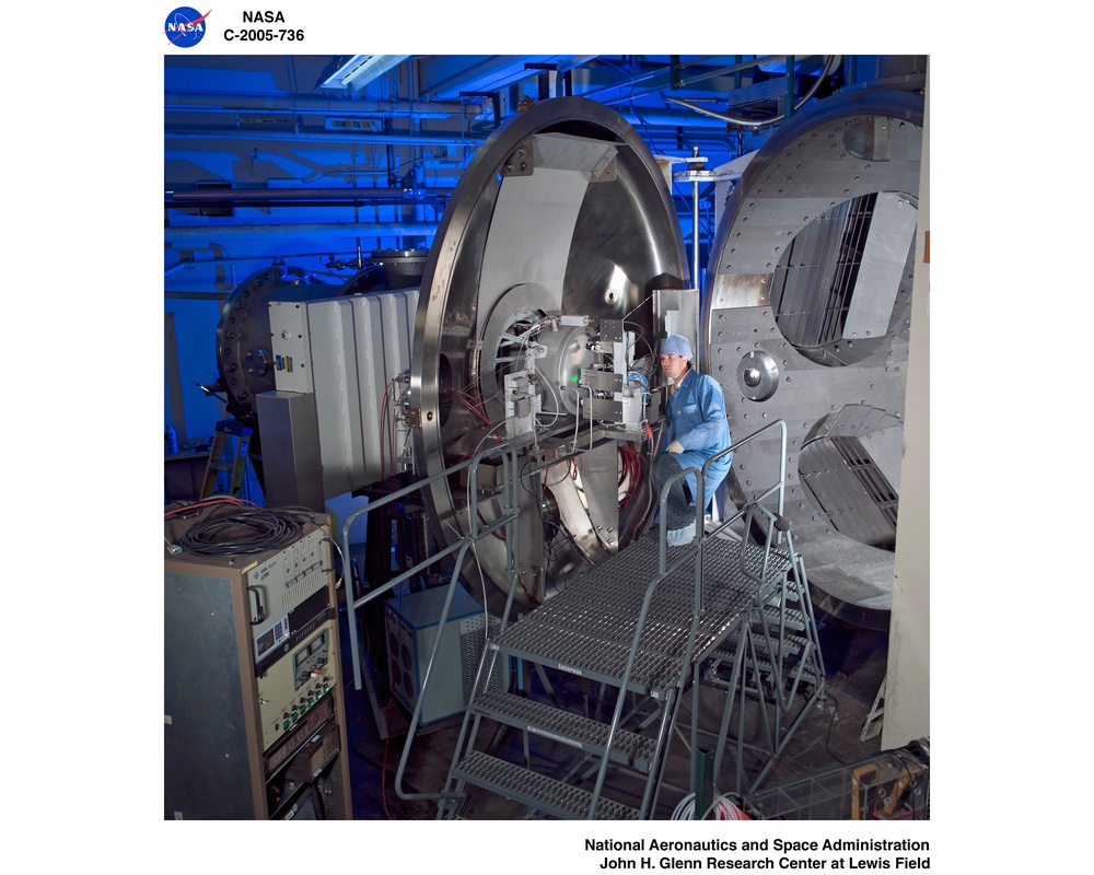 NASA's Evolutionary Xenon Thruster (NEXT) Long Duration Test (LDT) with  test article EM3 being installed into tank 16