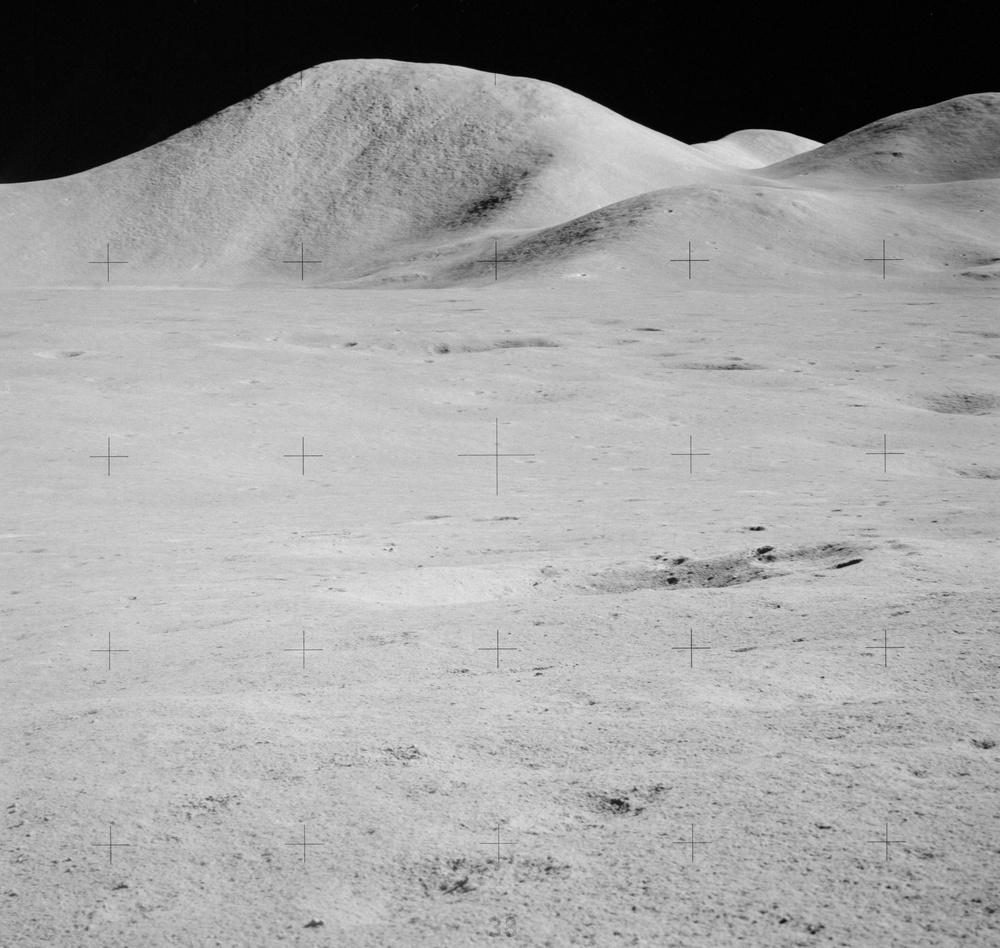 Apollo 15 Mission image - Panoramic view west of  Station 6 and Mt. Mons Hadley.