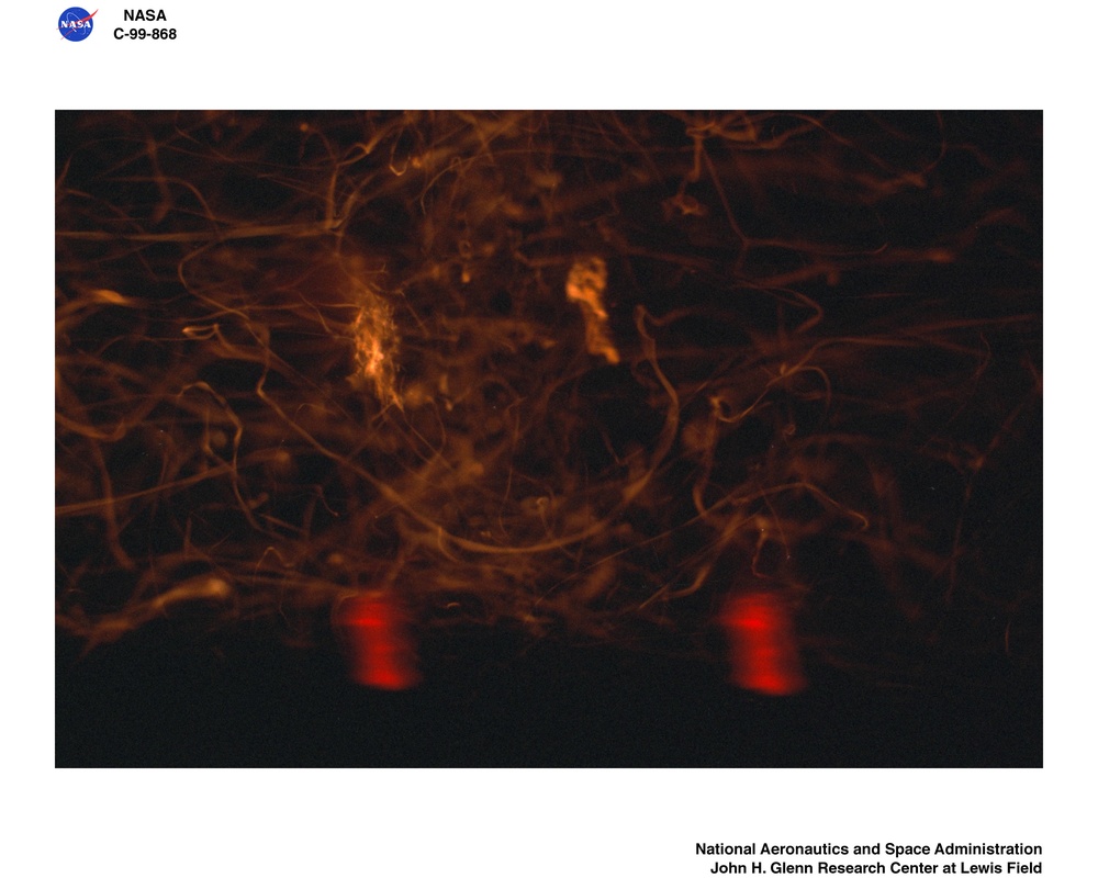 TRANSITION FROM IGNITION TO FLAME GROWTH UNDER EXTERNAL RADIATION IN THREE DIMENSIONS TIGER-3D TEST RESULTS FROM THE JAPAN MICROGRAVITY CENTER JAMIC