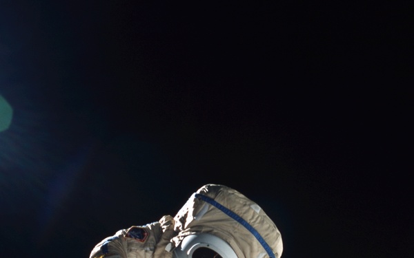 Bursch works near the SM thrusters during Expedition Four EVA 2