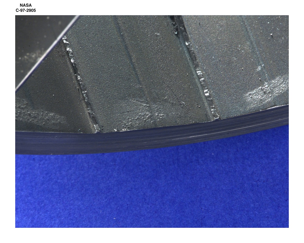 DAMAGED WAVE ROTOR COMPRESSOR COMPONENTS