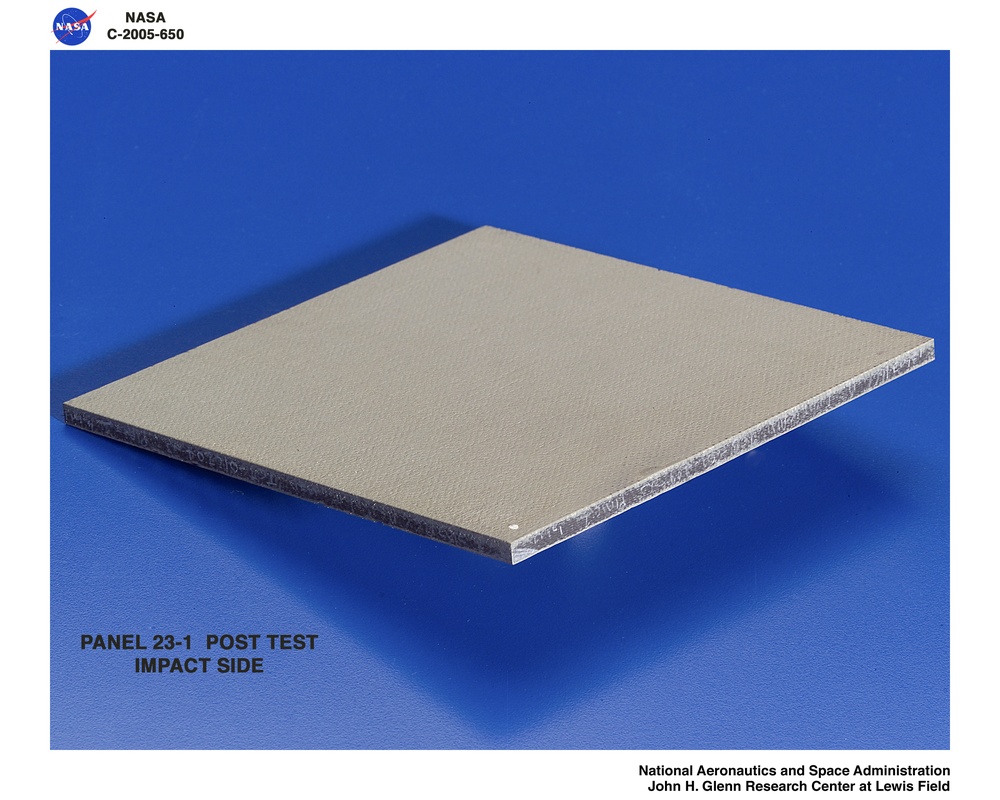 Panel 23-1 post test  RCC carbon / carbon fiber panels - the panels are space shuttle tile material being tested in the ballistics lab building 49