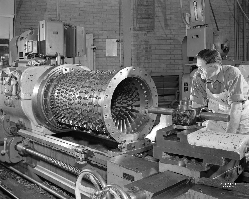 20 INCH COMPRESSOR SETUP IN AMERICAN LATHE IN THE MACHINE SHOP