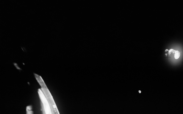 Apollo 13 Mission image  - Dark,slightly blurred edge-on view of the Command Module CM