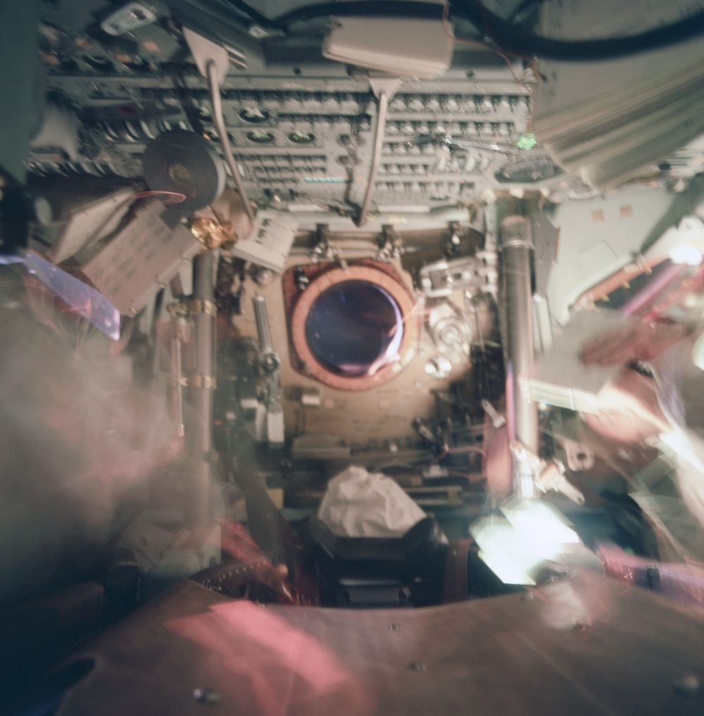 Apollo 9 Mission image - Blurred dark view of interior of Command module
