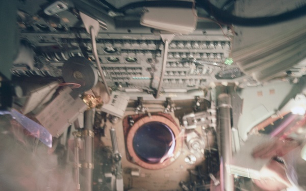 Apollo 9 Mission image - Blurred dark view of interior of Command module