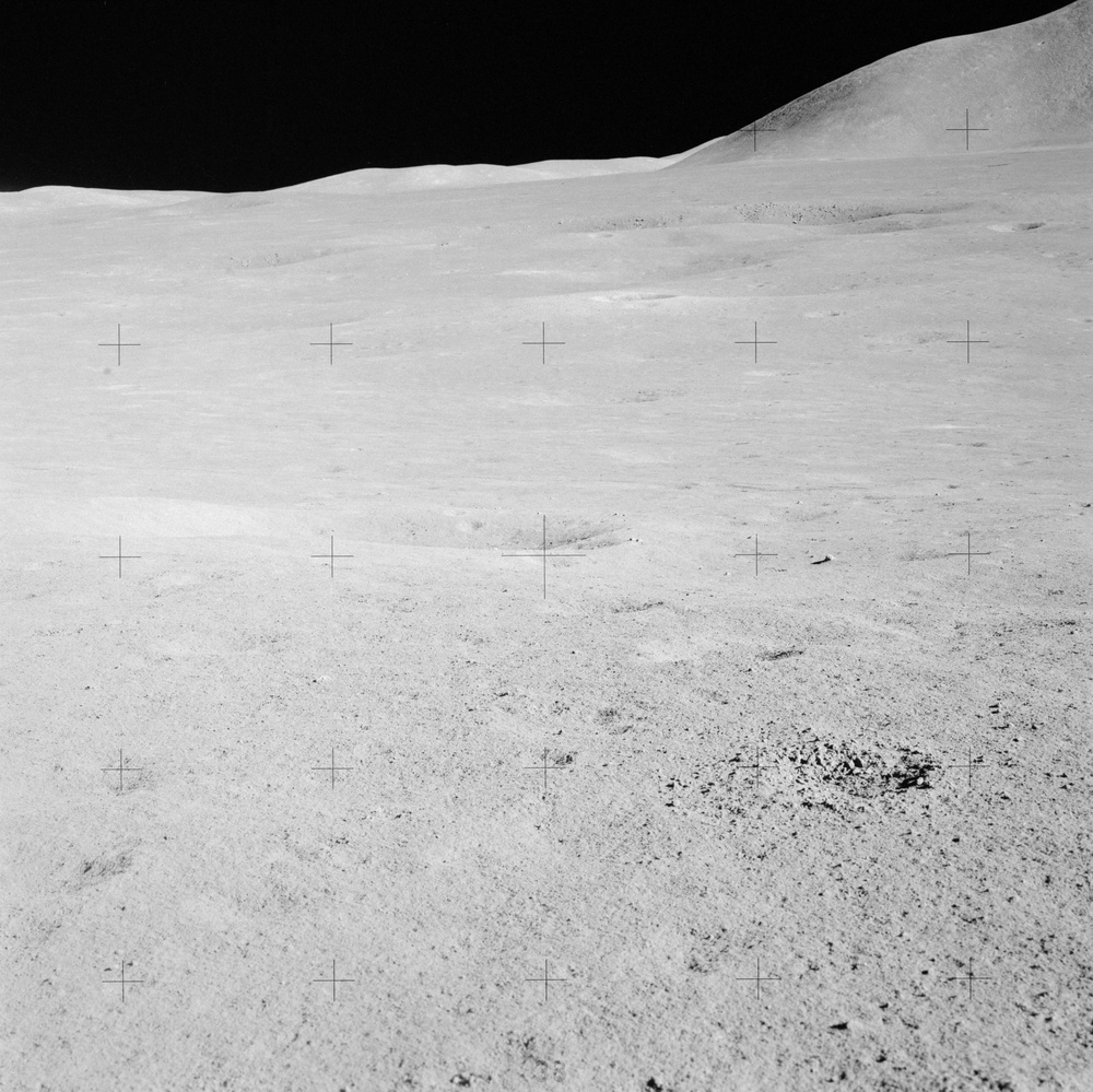 Apollo 15 Mission image - Panoramic view west of  Station 6 and Mt. Mons Hadley.