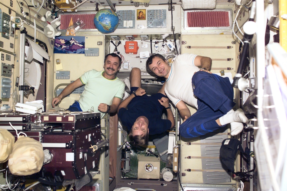 The Expedition Three crew pose in the Service Module