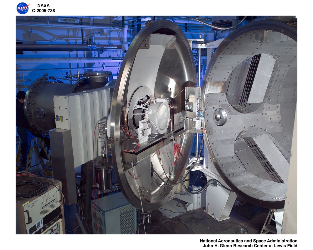 NASA's Evolutionary Xenon Thruster (NEXT) Long Duration Test (LDT) with  test article EM3 being installed into tank 16