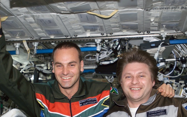 Shuttleworth and Onufrienko pose for a photo in U.S. Lab during Expedition Four