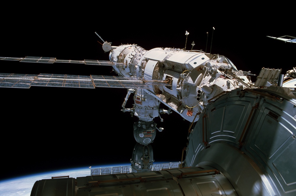 View of Soyuz, PIRS DC-1, SM, FGB, and Quest/Airlock taken during Expedition Six