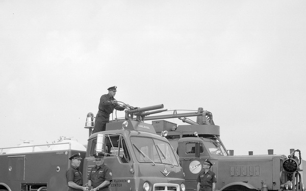 NEW AND OLD FIRE ENGINES AND NEW UNIFORMS