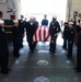 Wasp sailors prepare to conduct burials at sea