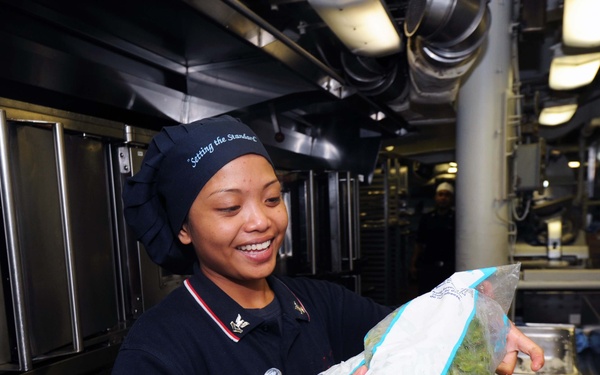 USS George H.W. Bush sailors perform duties