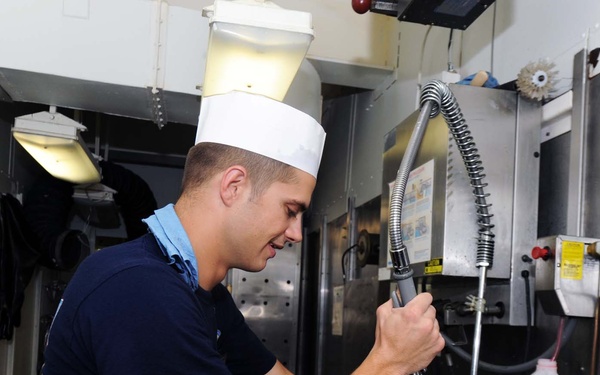 USS George H.W. Bush sailors perform duties