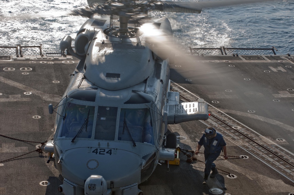 SH-60B Sea Hawk prepares to launch from USS Winston S. Churchill