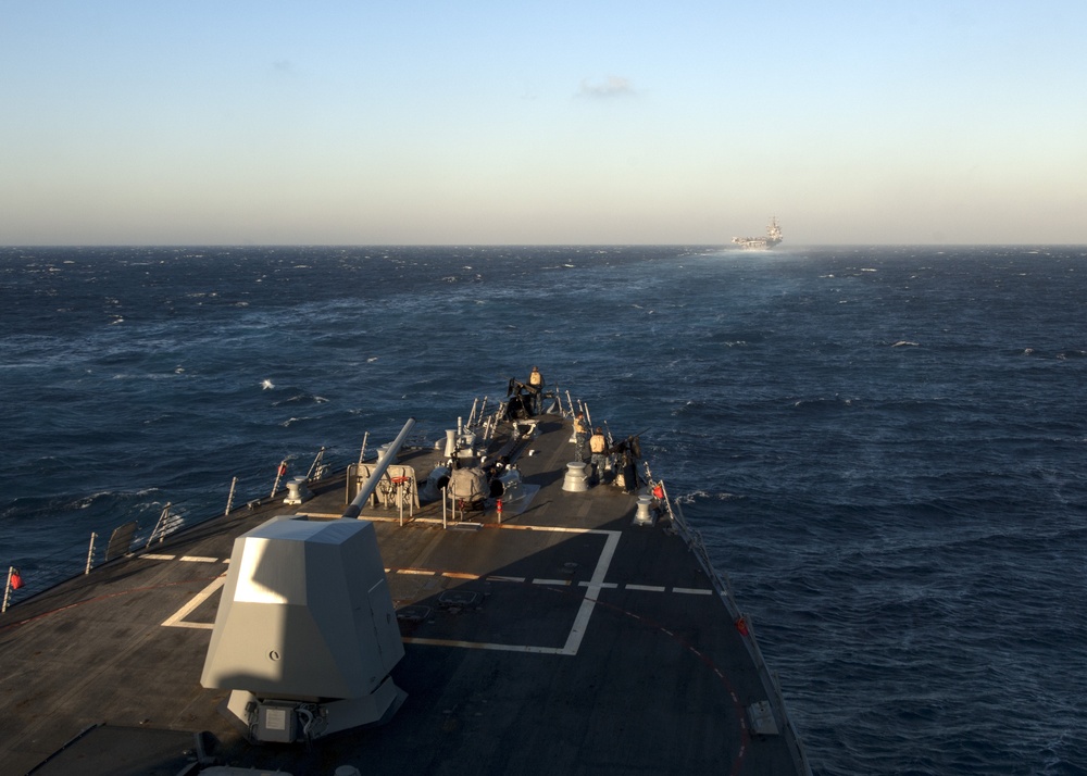 USS Enterprise passes through the Strait of Gibraltar