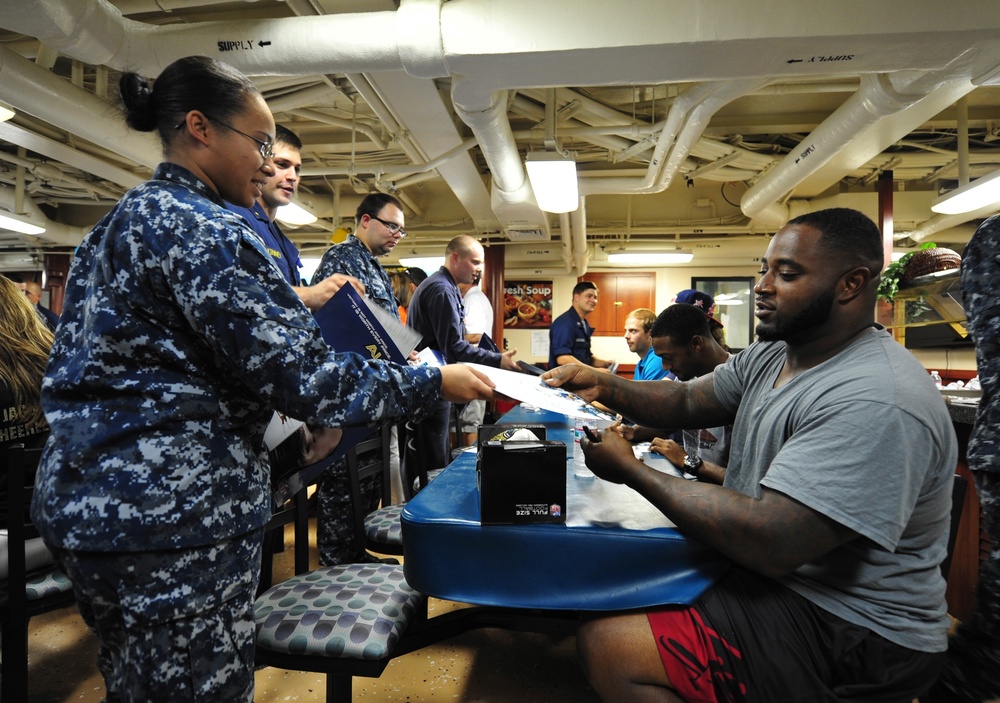 Jacksonville Jaguars visit sailors on USS Philippine Sea