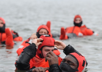 Coast Guard crew trains with cold water survival swims