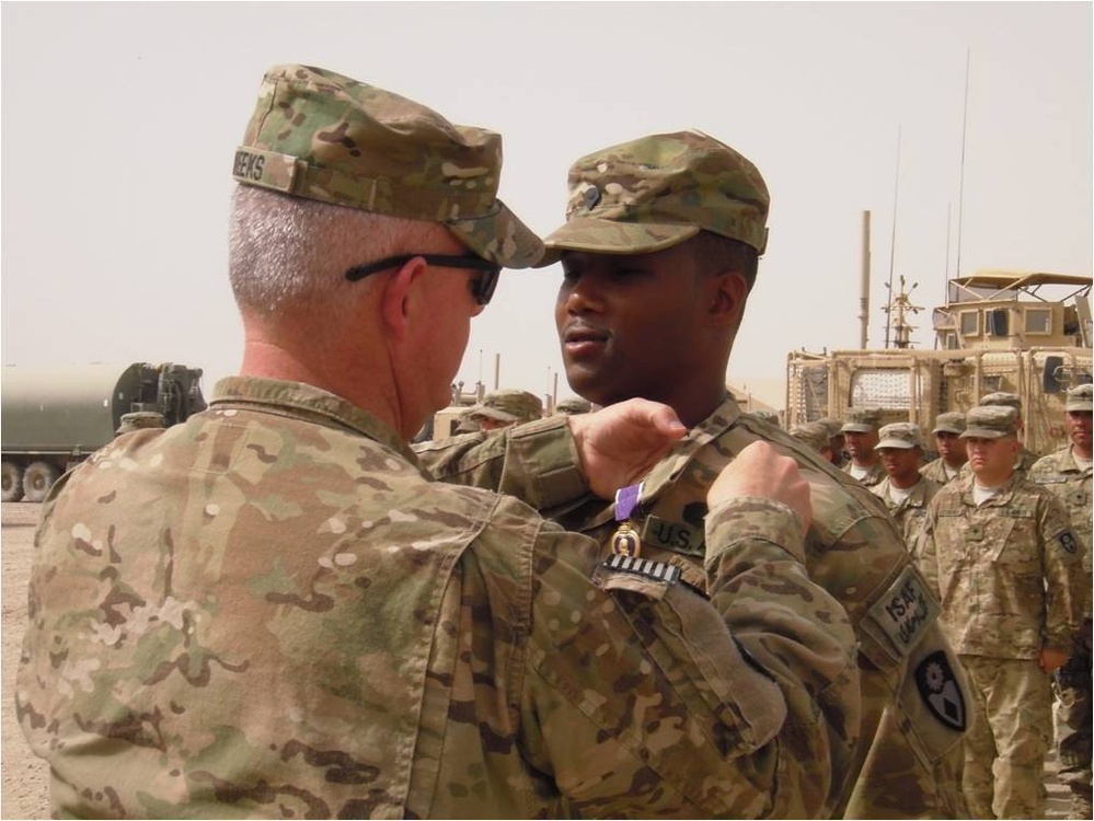 Bridging soldier awarded Combat Action Badge and Purple Heart