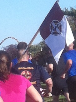 Cadet Francis Burghart carries 338th Medical Brigade guidon