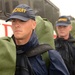 Coast Guard recruits prepare to board buses to evacuate Training Center Cape May