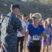 Commanding officer greets runners during Lake Norconian 5K