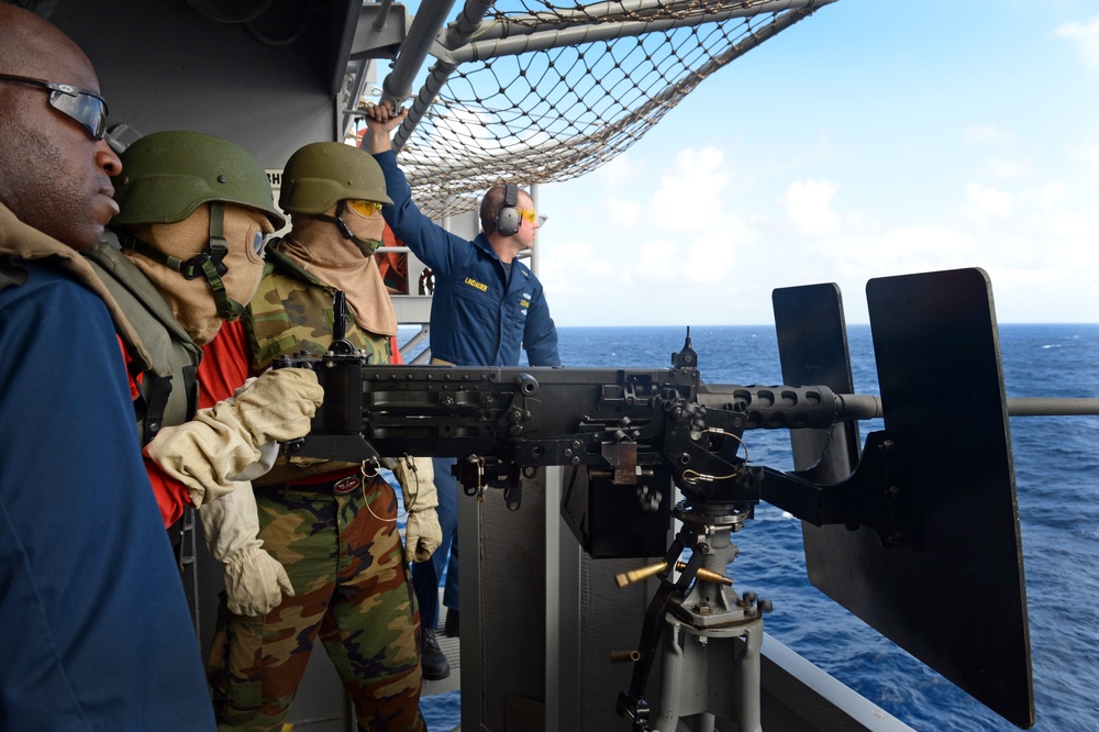 USS Bonhomme Richard sailor fires machine gun
