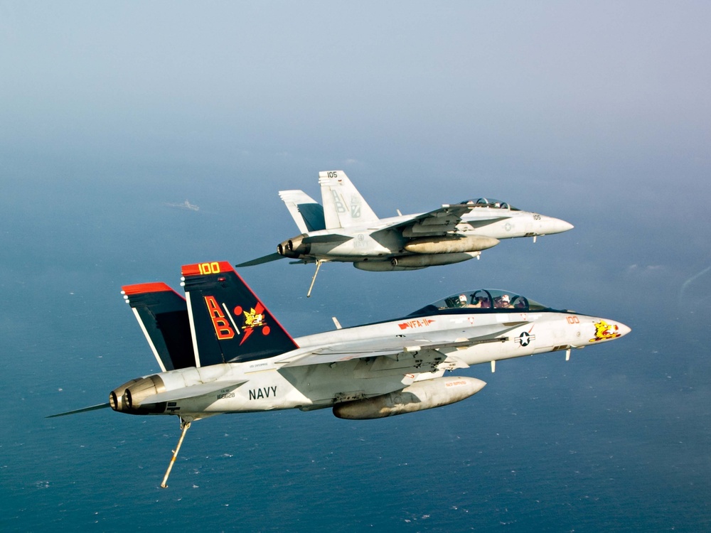 F/A-18F Super Hornets fly in formation