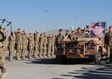 Tarin Kot bids farewell to a fallen comrade