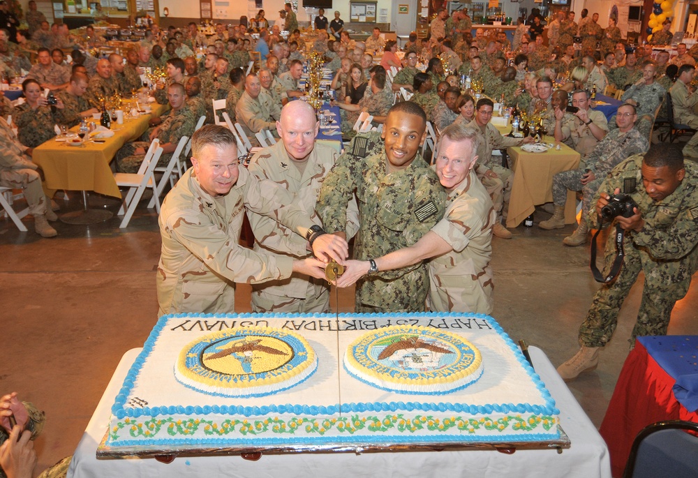 Cutting the birthday cake during the Navy Birthday Ball