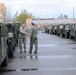 National Guard Airmen shuttle Army National Guard Humvees