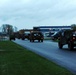 National Guard Airmen shuttle Army National Guard Humvees