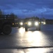 National Guard Airmen shuttle Army National Guard Humvees