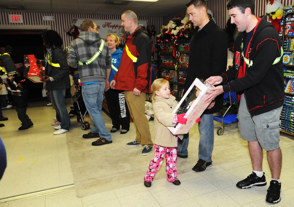Soldiers take care of soldiers by donating more than $2,800 worth of toys