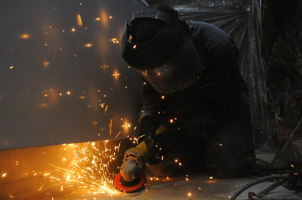 Sailor performs maintenance aboard USS Curtis Wilbur